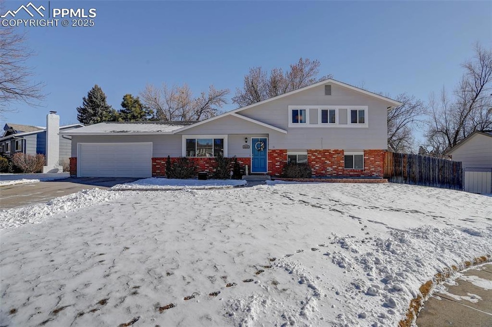 Split level home featuring a garage
