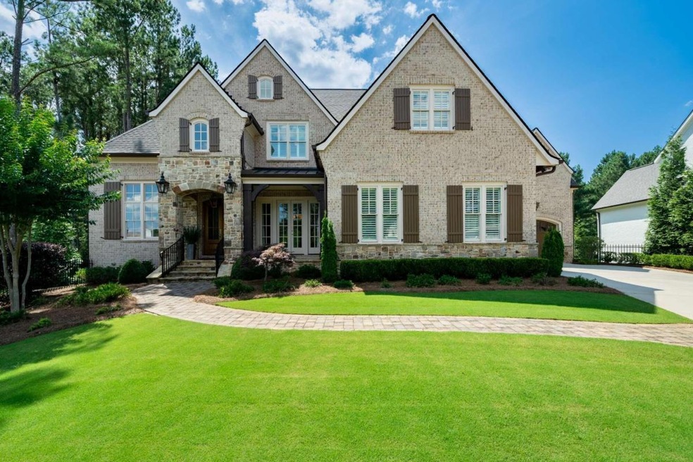 This gorgeous 4 sides brick home overlooks the 16t