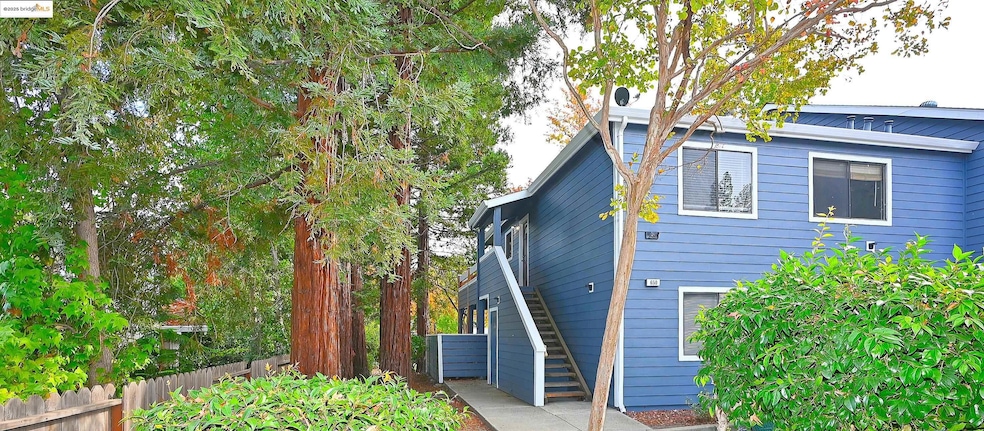 View of home's exterior featuring stairs