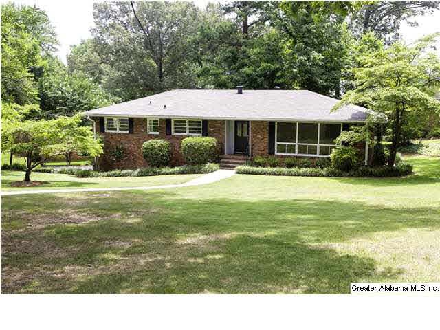 Welcome Home! All brick home is situated on large 