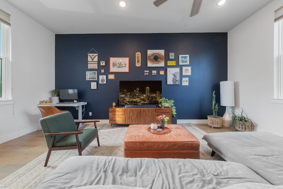 Living room featuring a wealth of natural light, l