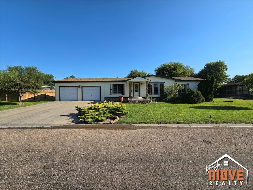 708 W Deal Ave, Sublette, KS 67877 - photo 1