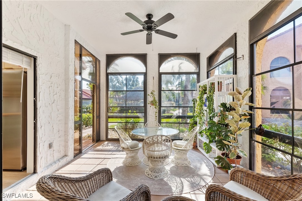 Sunroom with ceiling fan