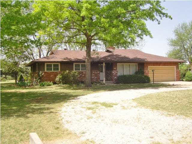 Circle Drive leads to the 1/2 brick home with newe