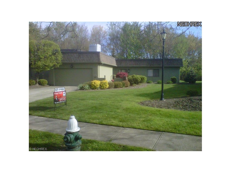 End unit ranch with attached two car garage.