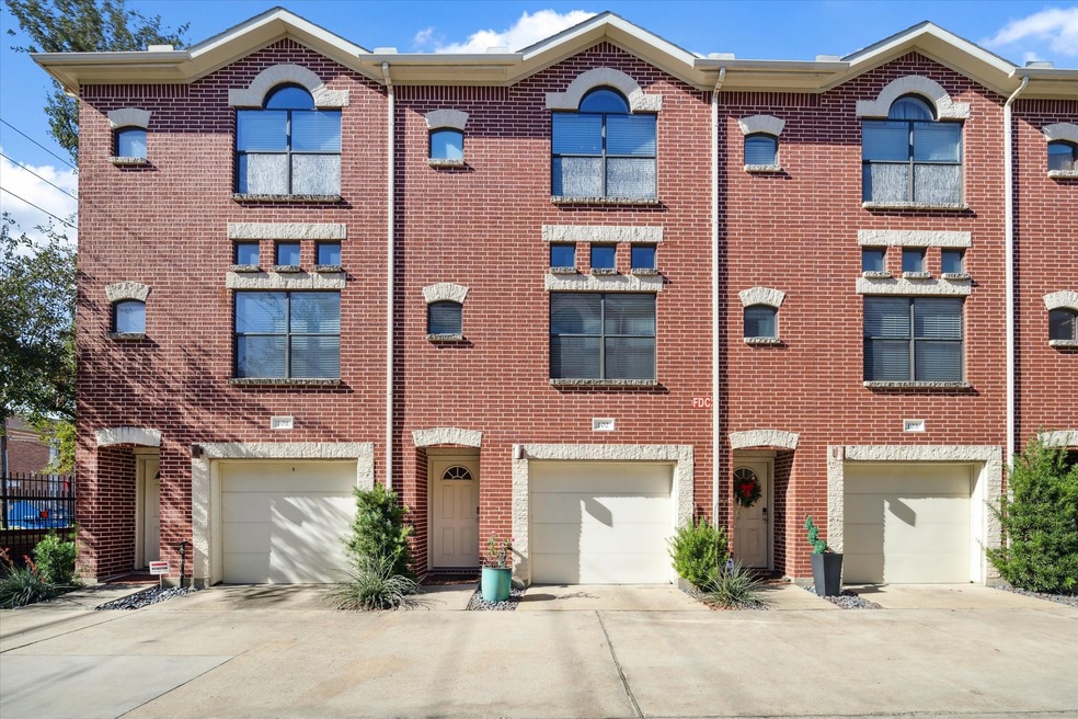Well maintained brick exterior townhome in GATED C