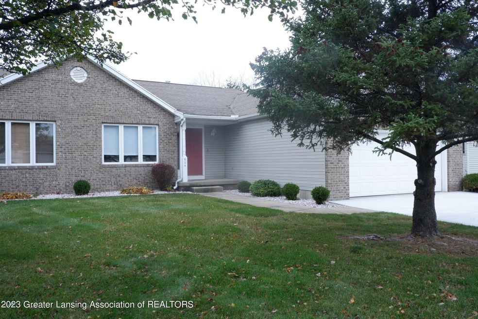 604 White Pine Blvd, Lansing, MI 48917 - photo 1