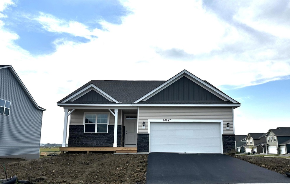 Welcome to the Harmony floor plan in Whispering Fields!  This is the actual front of the home.  Sod coming soon!
