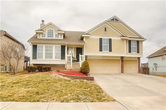 1504 Drury Cir, Raymore, MO 64083 - photo 1