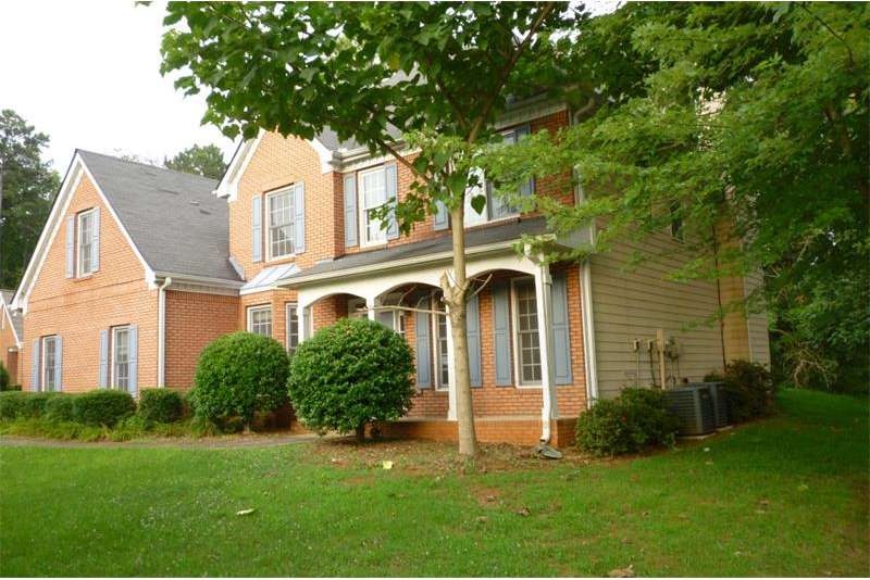 FRONT VIEW. COVERED ROCKING CHAIR FRONT PORCH