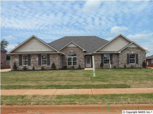 All brick Energy Star Home under construction. The Lexington H is one of our most popular plans. The plan is very open and features a 4 bedrooms and sunroom.