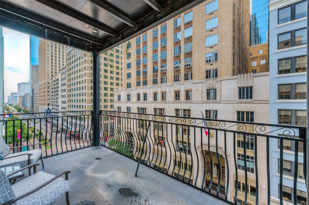Large balcony off living area overlooking Main Str