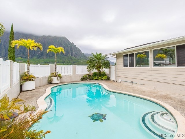 Backyard with Ko'olau views and private pool.
