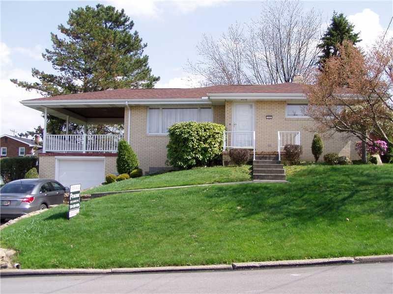 Exterior Front. Well maintained brick ranch with c