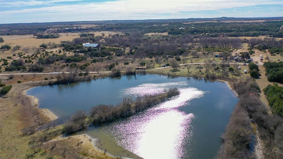 Stocked w/ BASS&CATFISH. Great fishing at the Biggest pond on the property. Spring runs into pond.