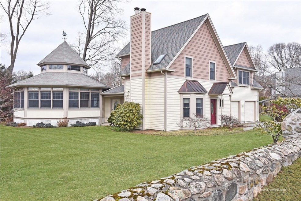 front with beautiful stone wall.