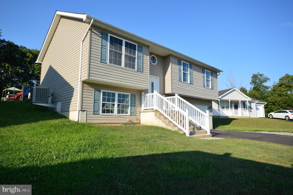 212 Freight Car Cir, Bunker Hill, WV 25413 - photo 1