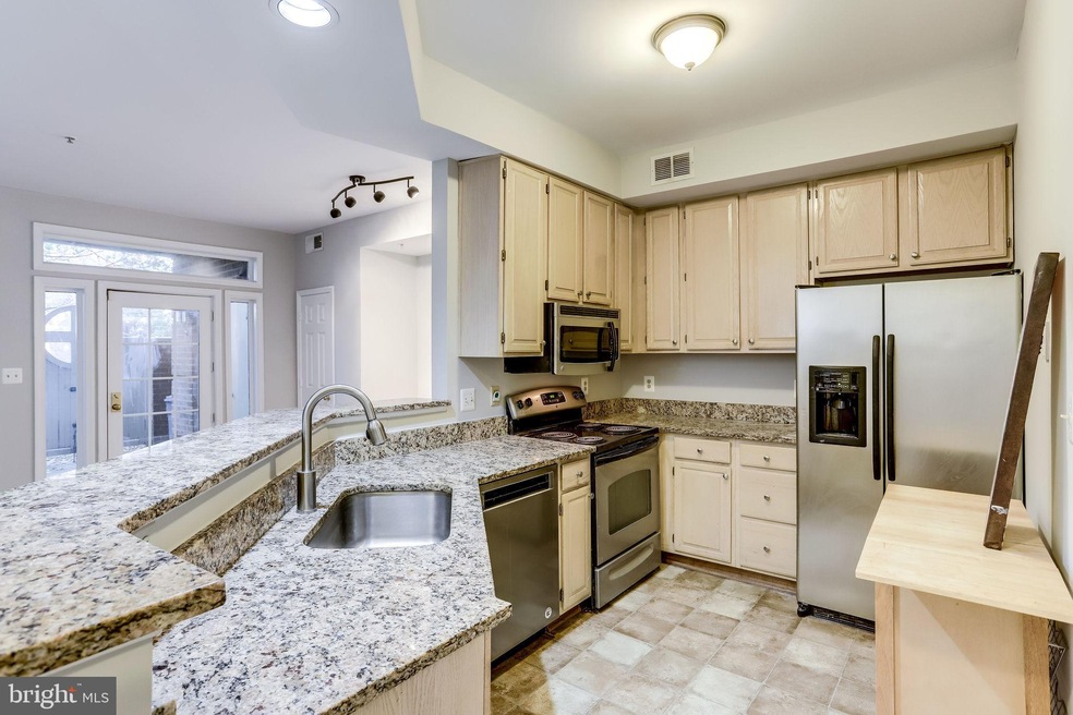 1357 Garden Wall Cir unit 708, Reston, VA 20194 - photo 1