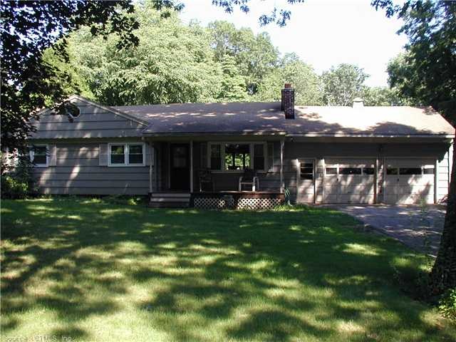 Exterior Front. Curbside view, level lot, front po