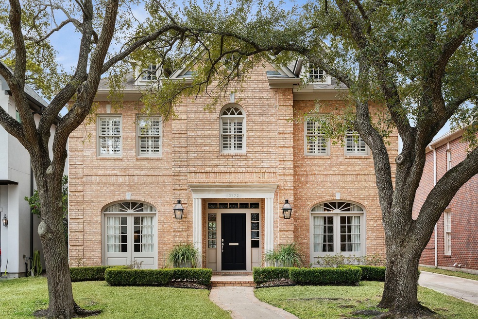 Fall in love with this beautiful brick home in the