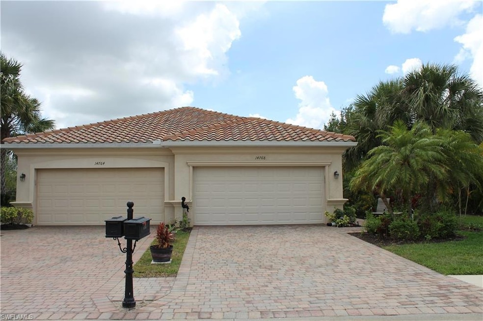 Garage with decorative driveway
