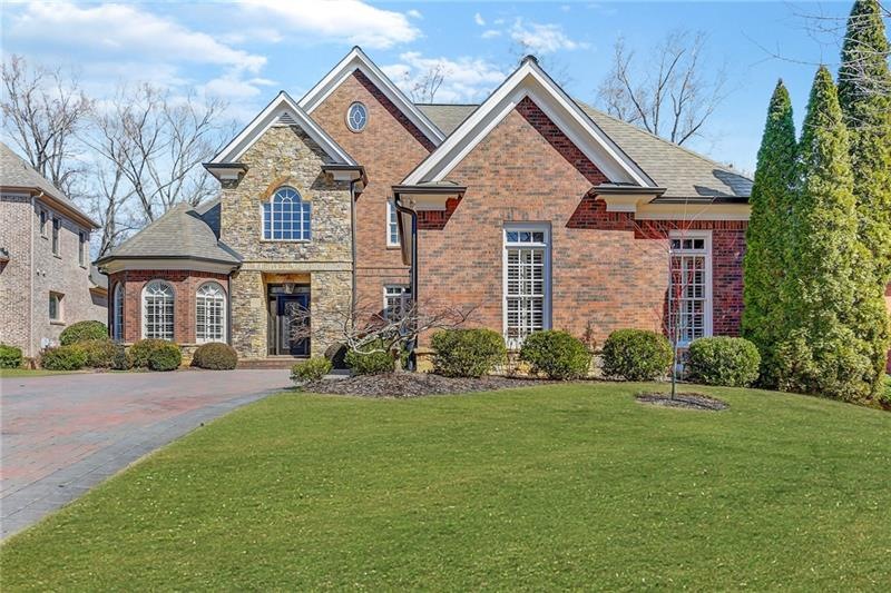 PRISTINE 3bdrm/2.5 BRICK & STONE beauty located on