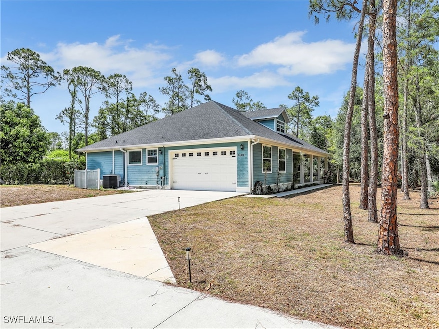 View of front facade featuring a garage