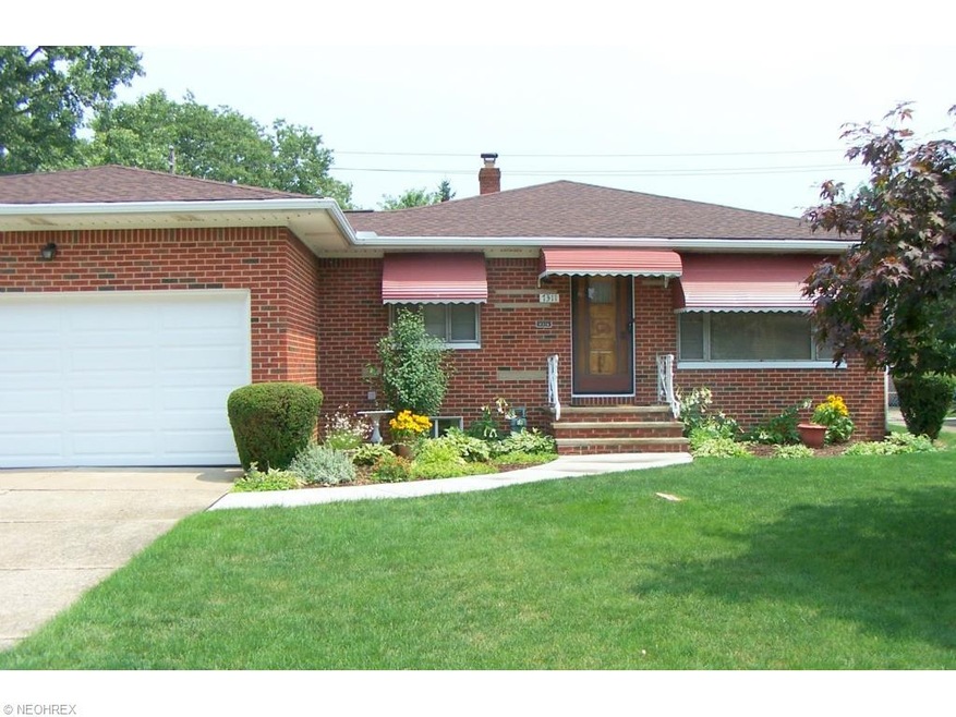 Brick Front Exterior with attached 2-car garage