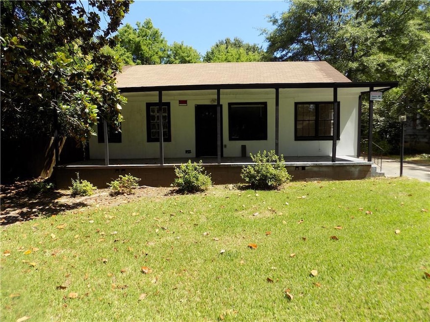 View of front of house featuring a front lawn and 
