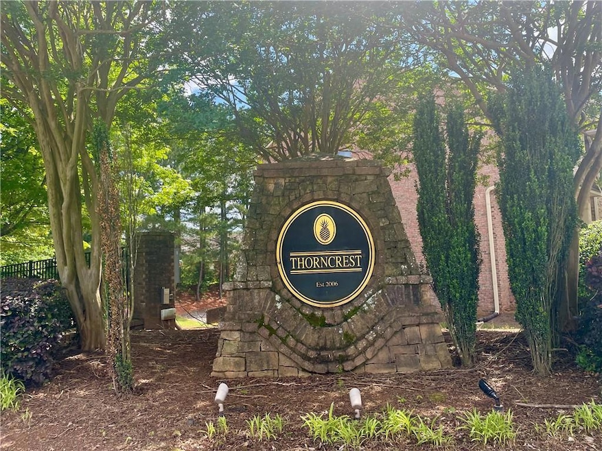 Community / neighborhood sign with fence
