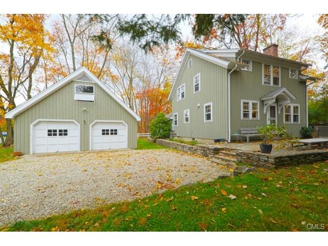 Country Charm...   Detached garage has loft storag
