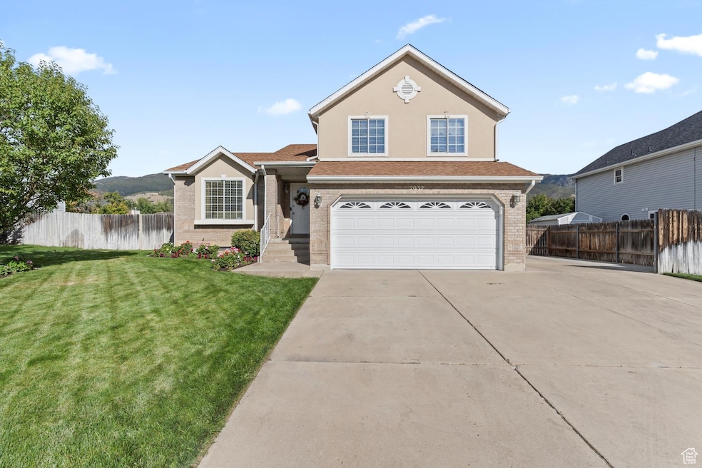 Traditional style house with brick, stucco, and siding