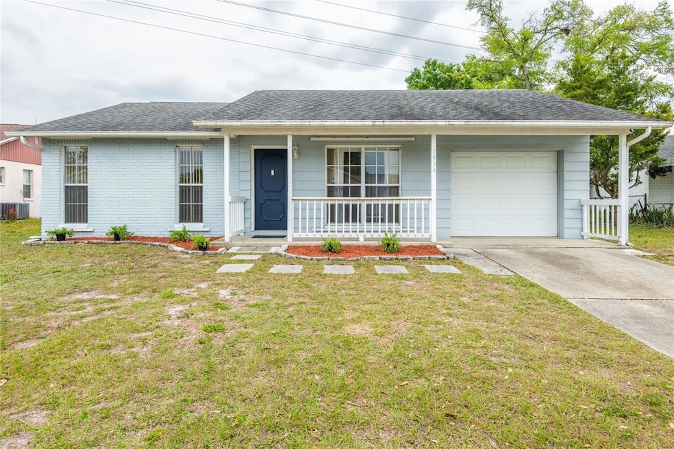 Must see 2 bedroom, 1 bath home FRESHLY PAINTED March 2025 with CATHEDRAL CEILINGS, LAMINATE FLOORING, GARAGE STORAGE CABINETS, HURRICANE SHUTTERS, FENCED BACKYARD, NO REAR NEIGHBORS!