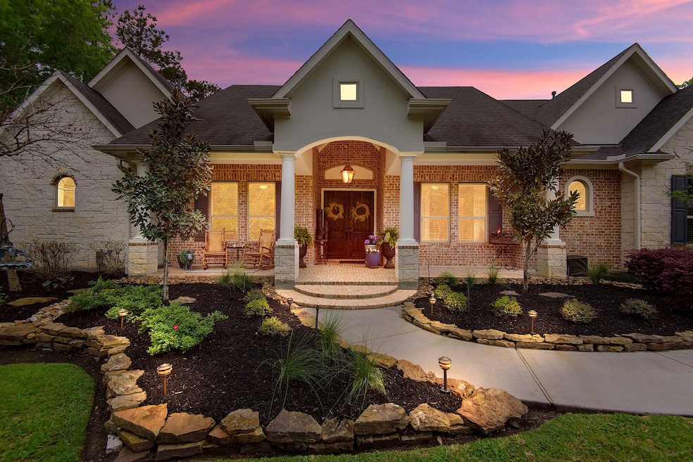 Absolutely stunning custom estate with jaw-dropping curb appeal!