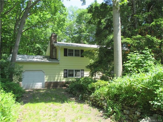 Exterior front with garage.