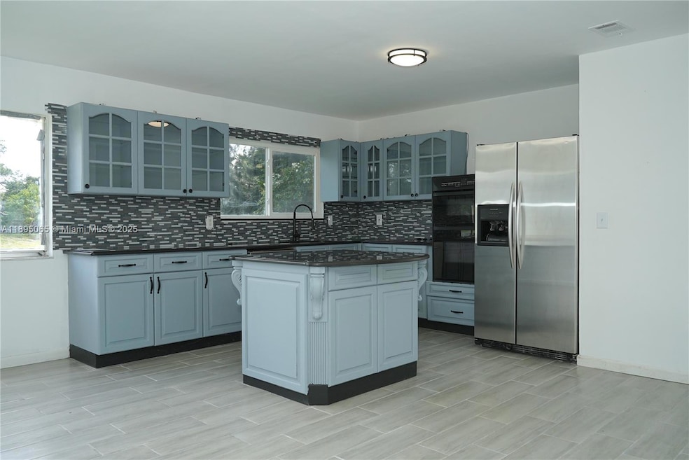 3311 SW Ensley Ct, Port Saint Lucie, FL 34953 - photo 1