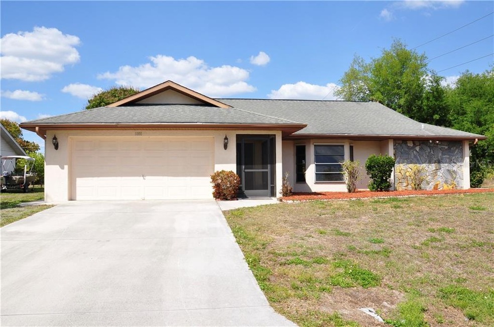 1000 Vega Ave NW, Port Charlotte, FL 33948 - photo 1