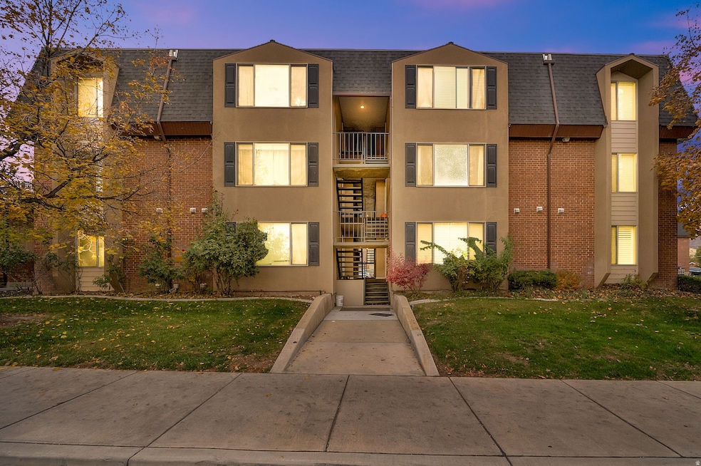 View of property with stairs