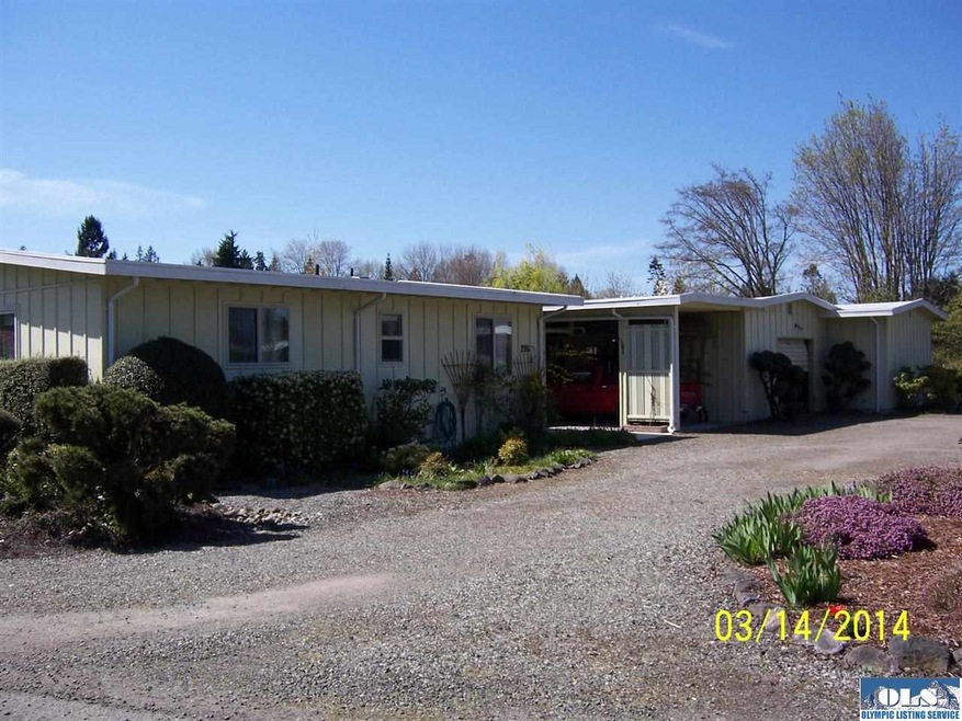 This home wraps around its lot taking full advanta