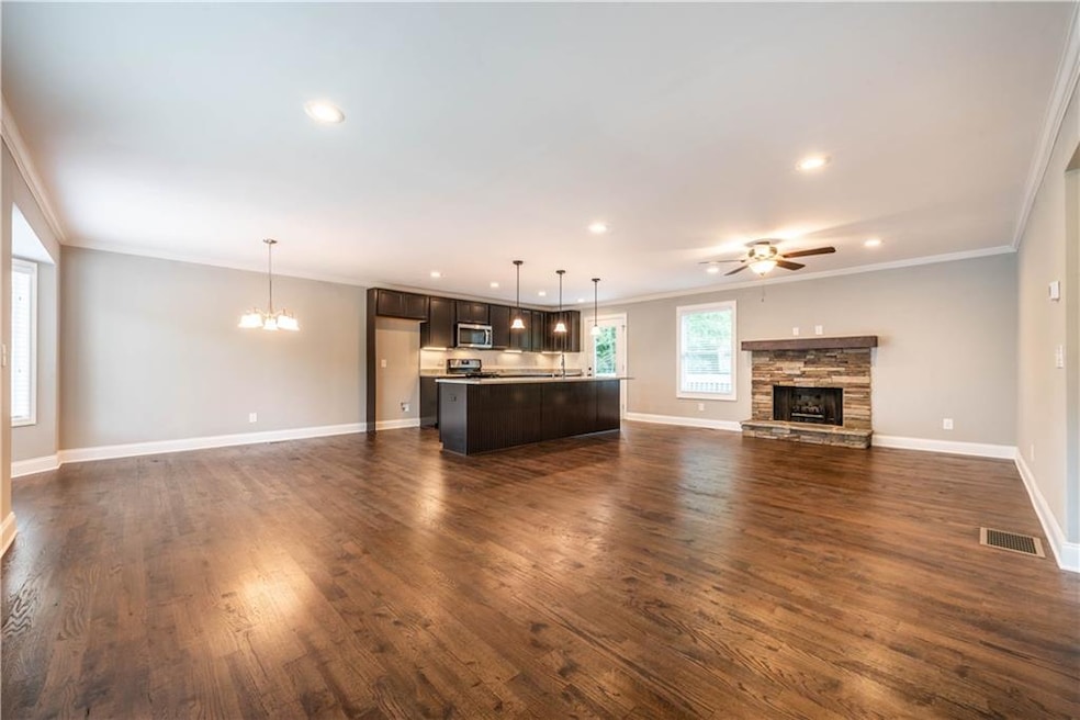 Beautiful new hardwood floors. The chef in the fam