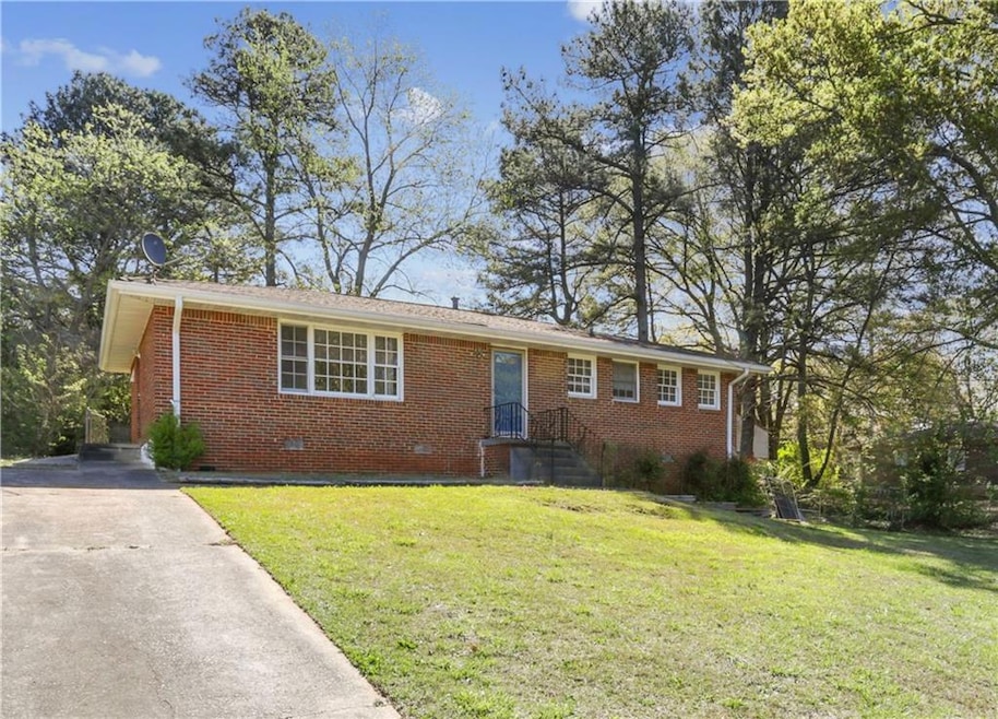 Ranch-style home with a large front lawn