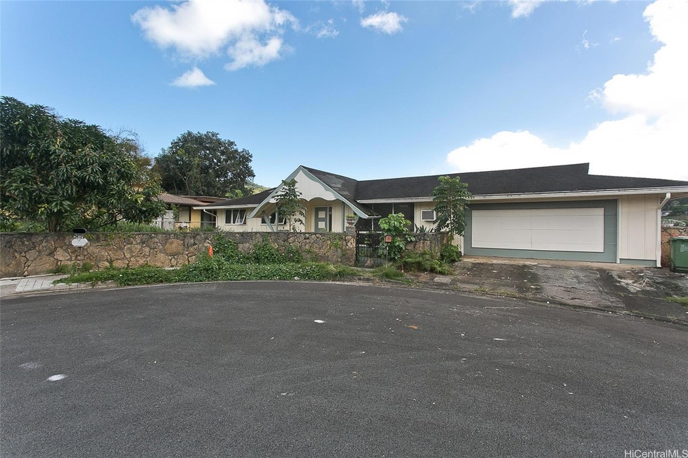 FRONT VIEW OF THE HOME IN A QUIET CUL-DE-SAC.