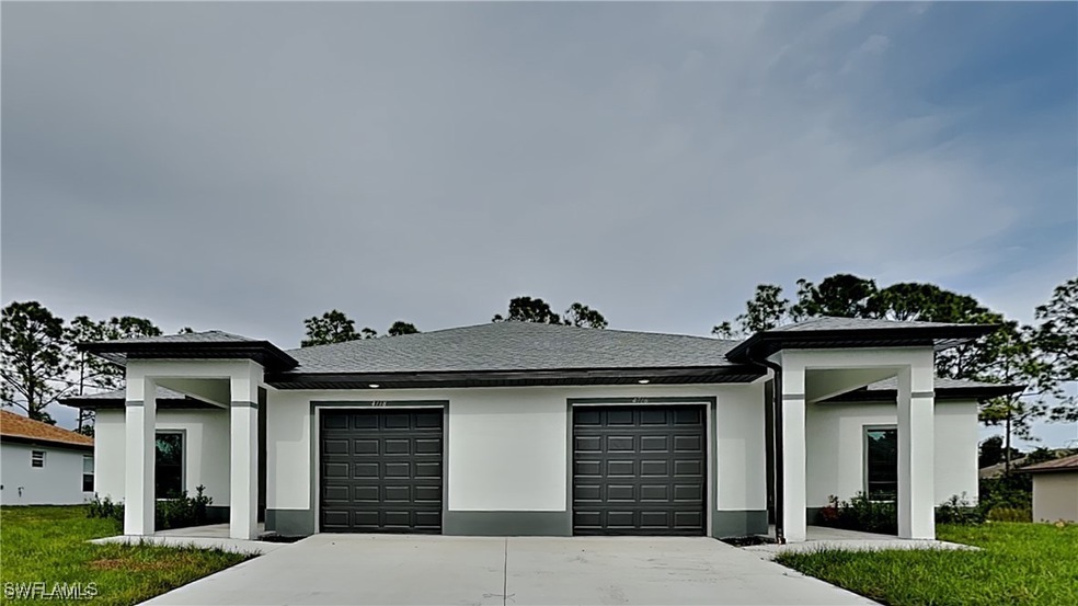 View of front of home featuring a garage and a fro