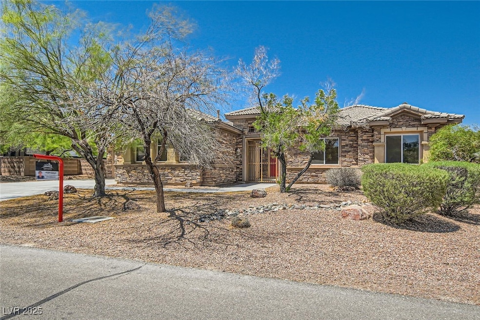 View of front of property with stone siding and a
