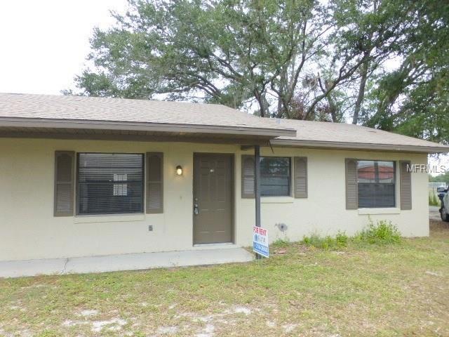 718 N Sinclair Ave, Tavares, FL 32778 - photo 1