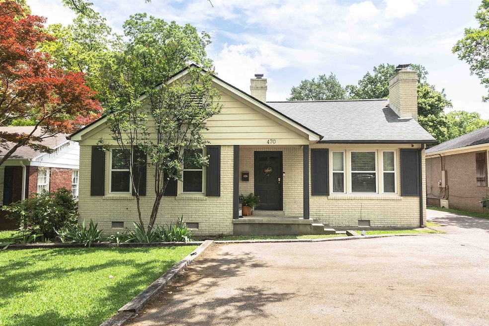 Bungalow-style home featuring crawl space, brick siding, and a chimney
