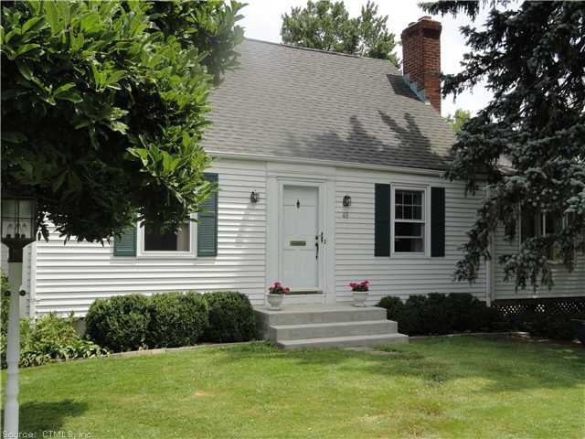 Exterior Front. Vinyl clad aluminum sided expanded
