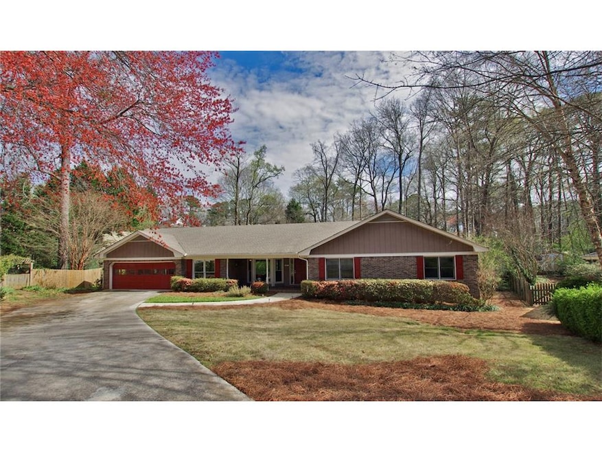 Large 4-sided brick ranch on large 1/2 acre cul-de-sac lot.  2 car attached garage.