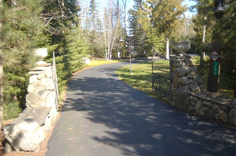 11675 N Pa Ba Shan Trail, Charlevoix, MI 49720 - photo 1