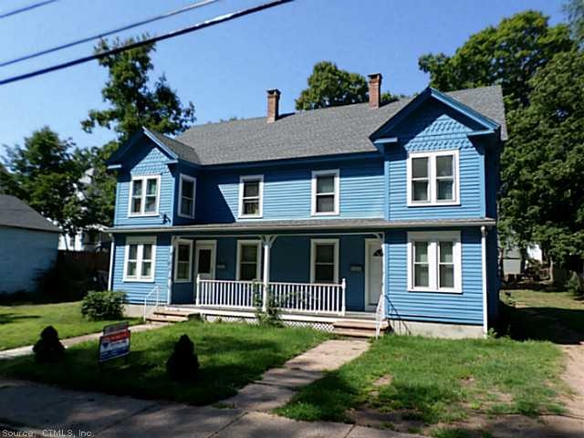 Exterior Front. Large Duplex on nice level lot